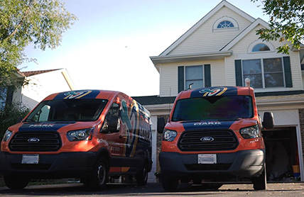 On the mark trucks in front of a house in Schaumburg, IL